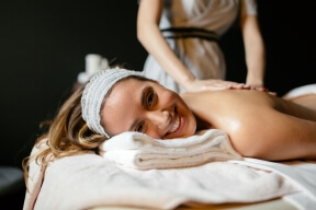 woman having back massage