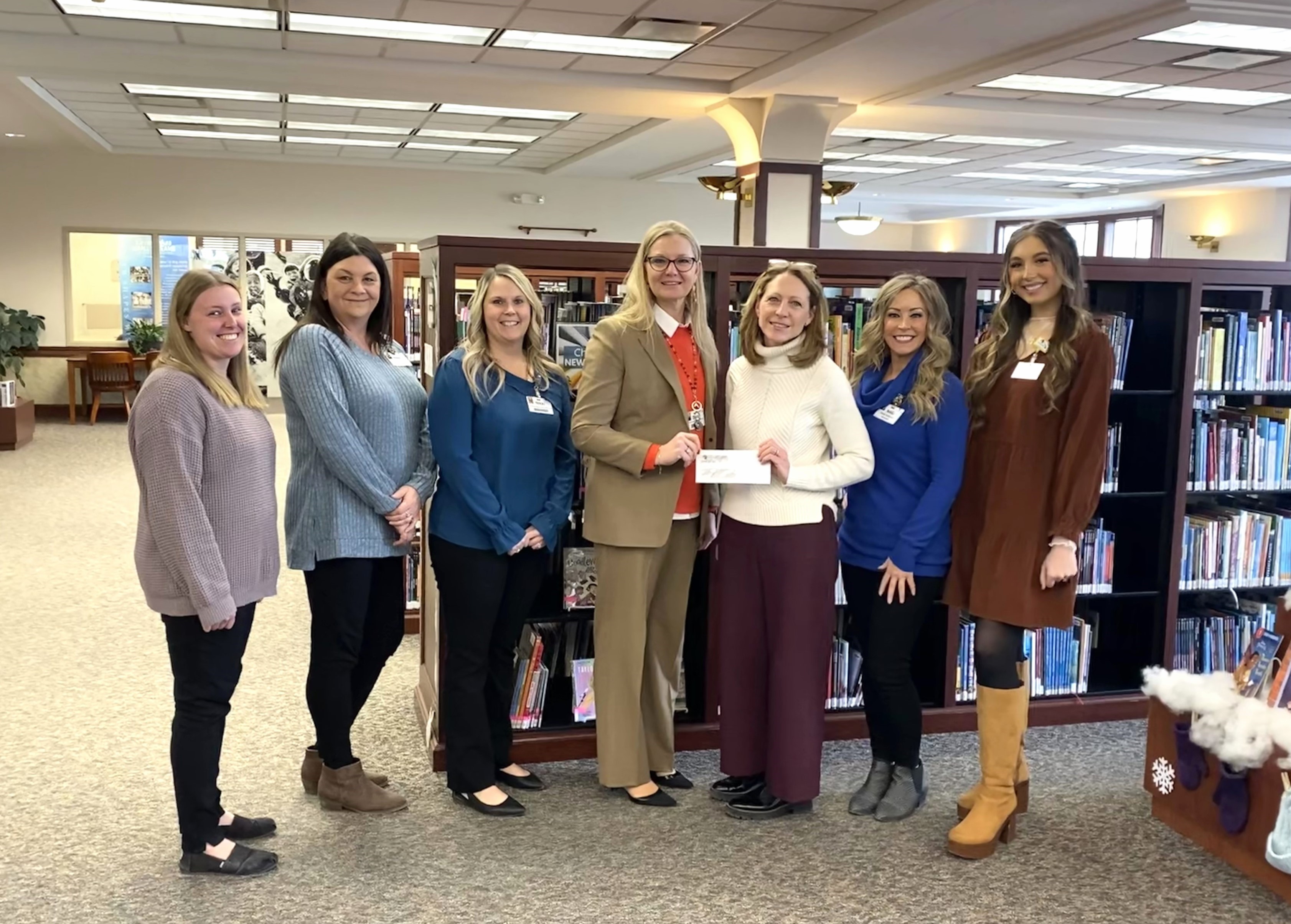 Mile Bluff Medical Center donates to the Hatch Public Library in Mauston